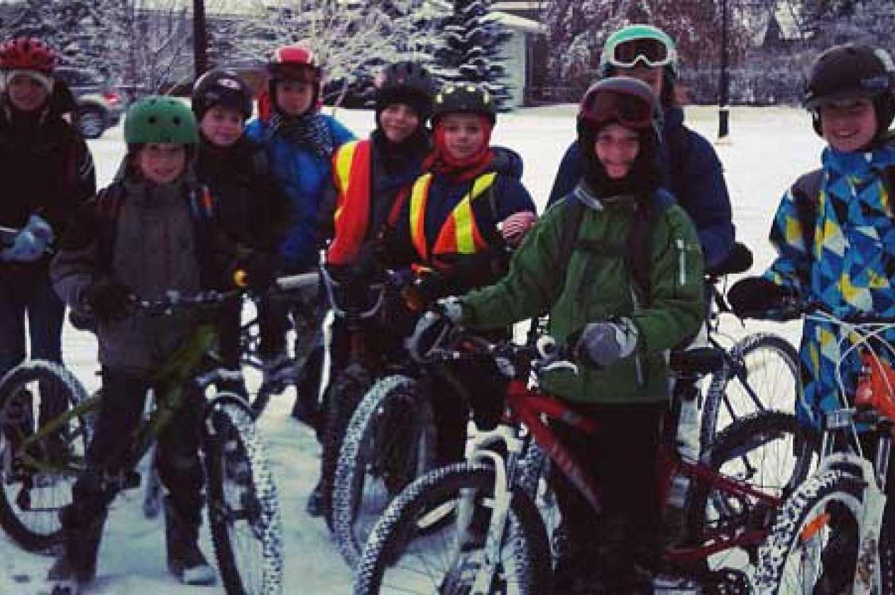 Photo of Calgary kids biking in the winter by Tom Babin