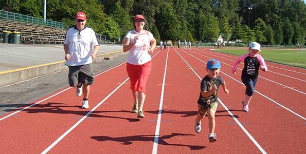 Clare Adams and her family run the 100 m