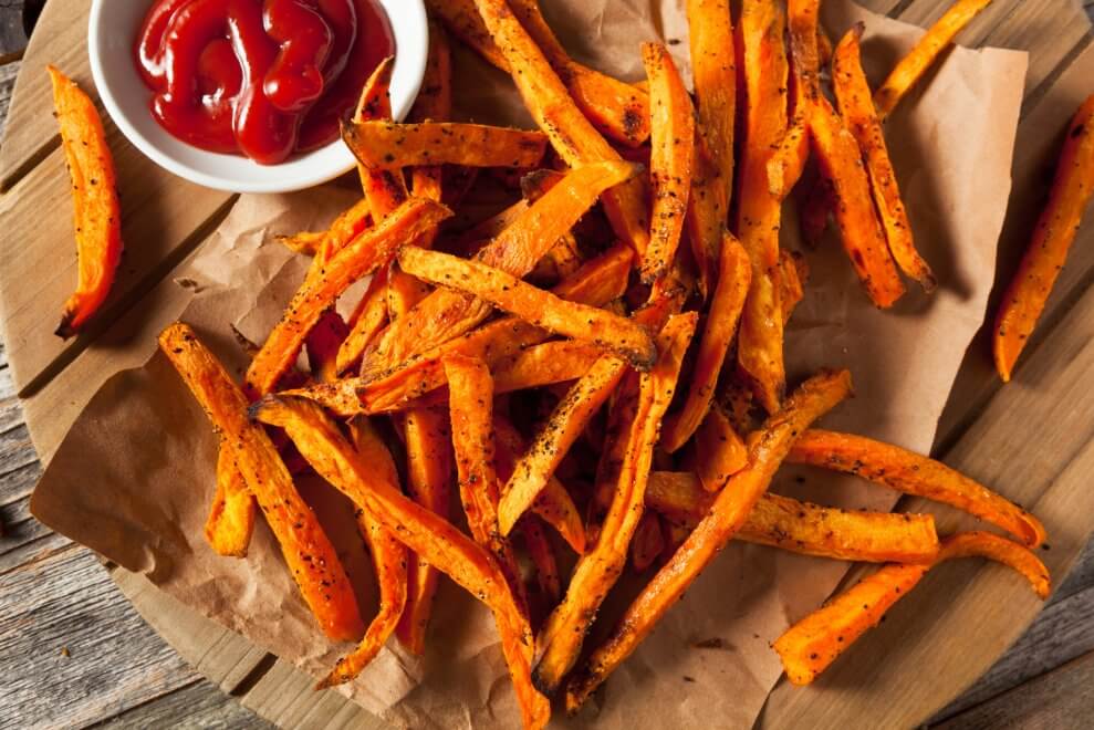 A plate of yam fries with ketchup