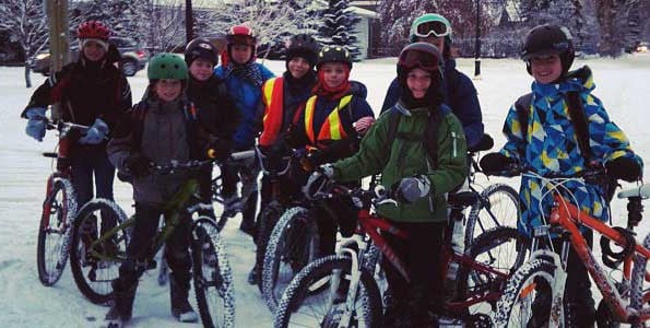 Photo of Calgary kids biking in the winter by Tom Babin