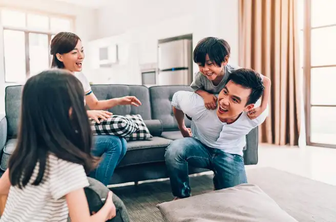 family-playing-in-living-room