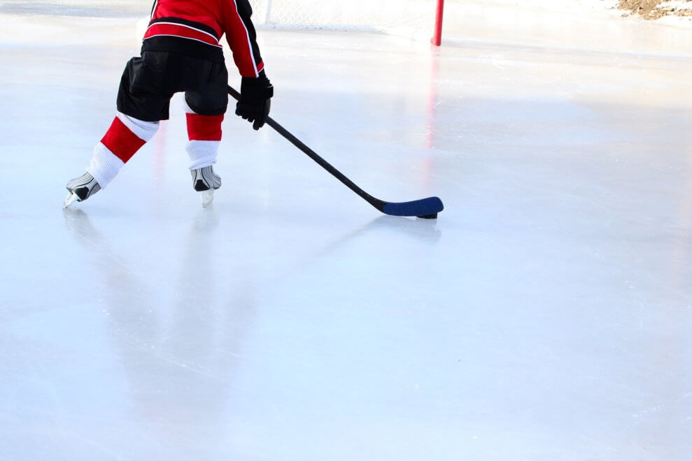 child-skating-in-hockey-pads