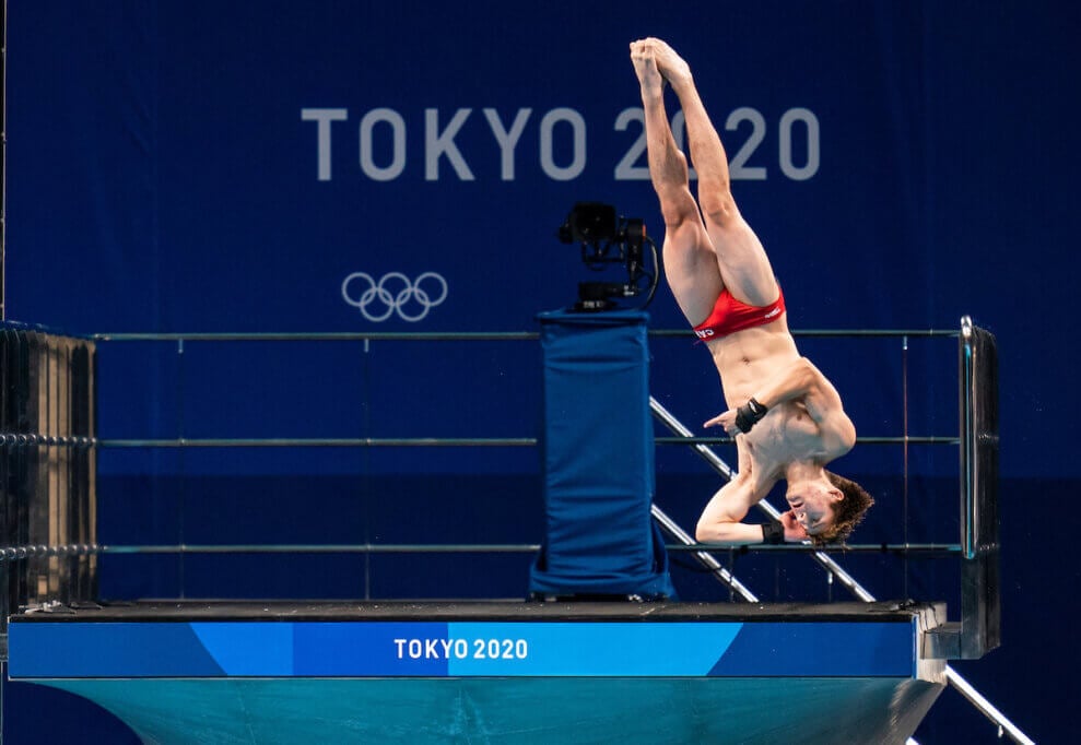 Canadian diver Nathan Zsombor-Murray dives into the pool at the  Tokyo 2020 Olympic Games.
