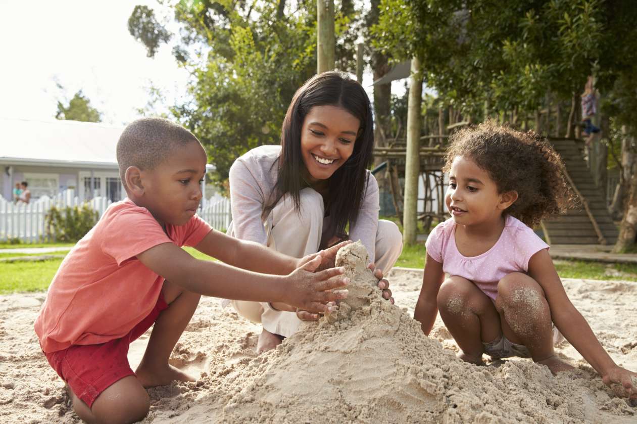 parents playing with children