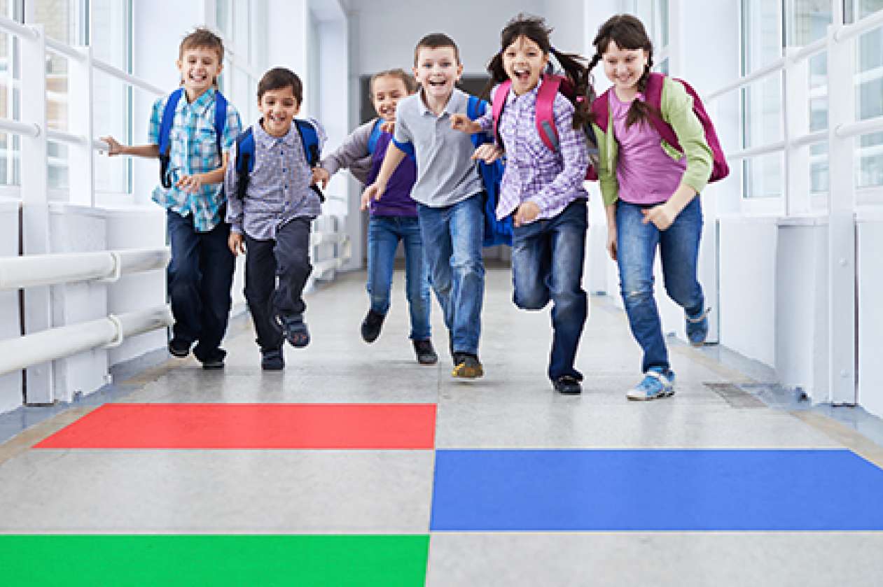 These school children are being encouraged to ‘run’ in the hallway