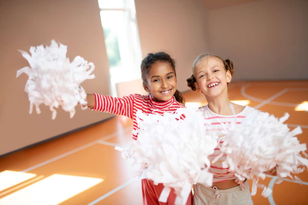 Introduce your child to cheerleading at home with these basic movements