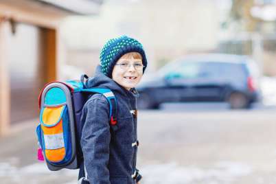 7 ways to get your kids to walk to school smiling, even in winter